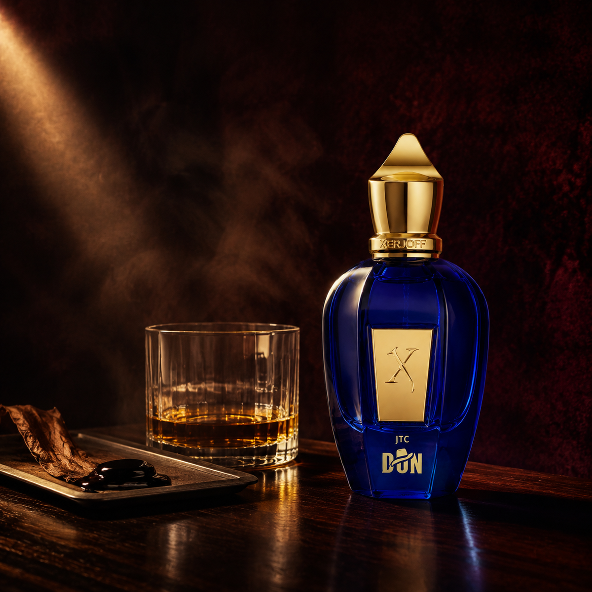 Xerjoff Don v temném zátiší s whisky a tabákovým listem – MrRizz