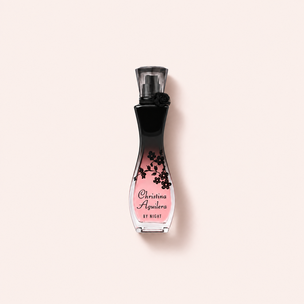 Christina Aguilera by Night EDP 50 ml na teplém růžovém pozadí – MrRizz
