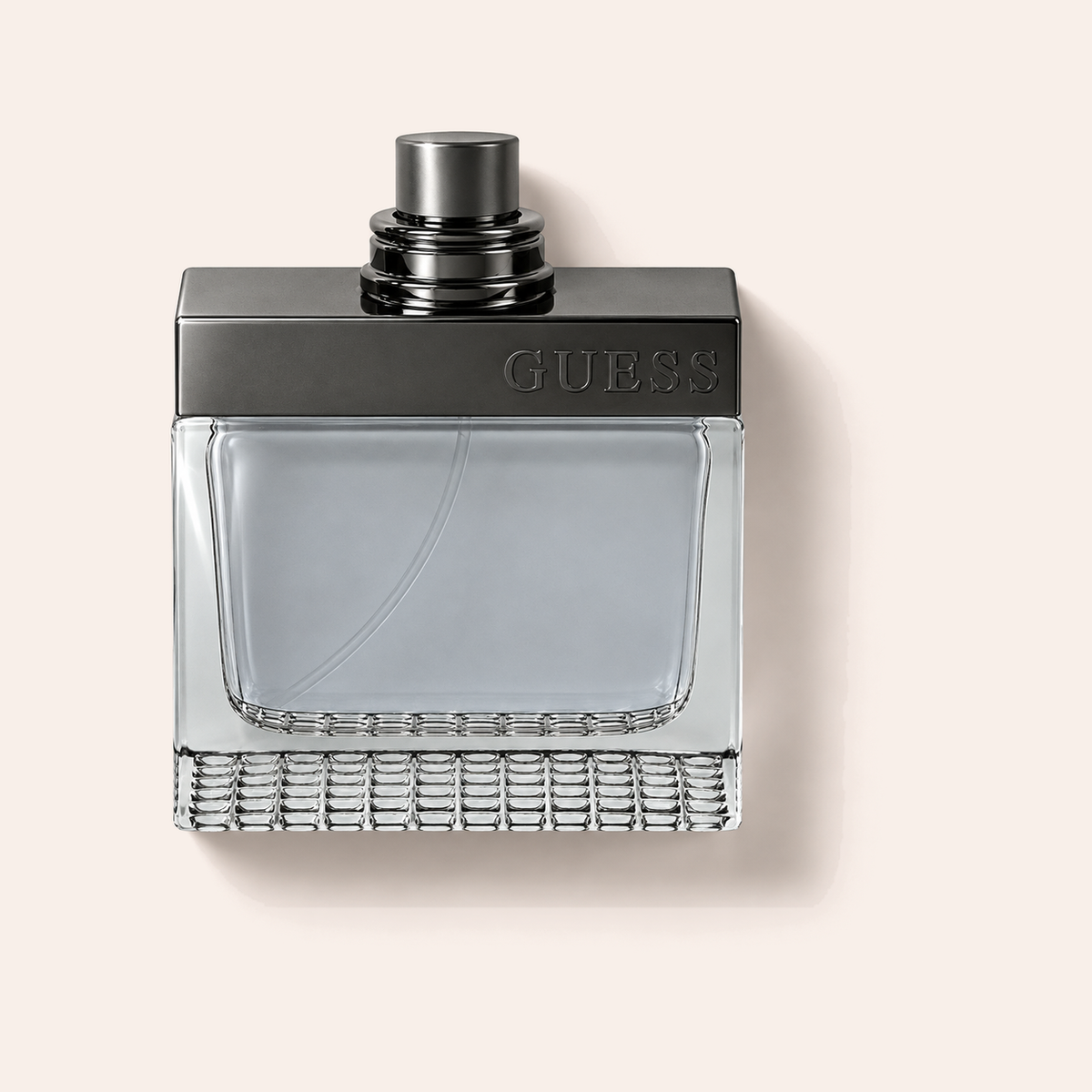 GUESS Seductive Homme EDT 100 ml na jemně růžovém pozadí – MrRizz