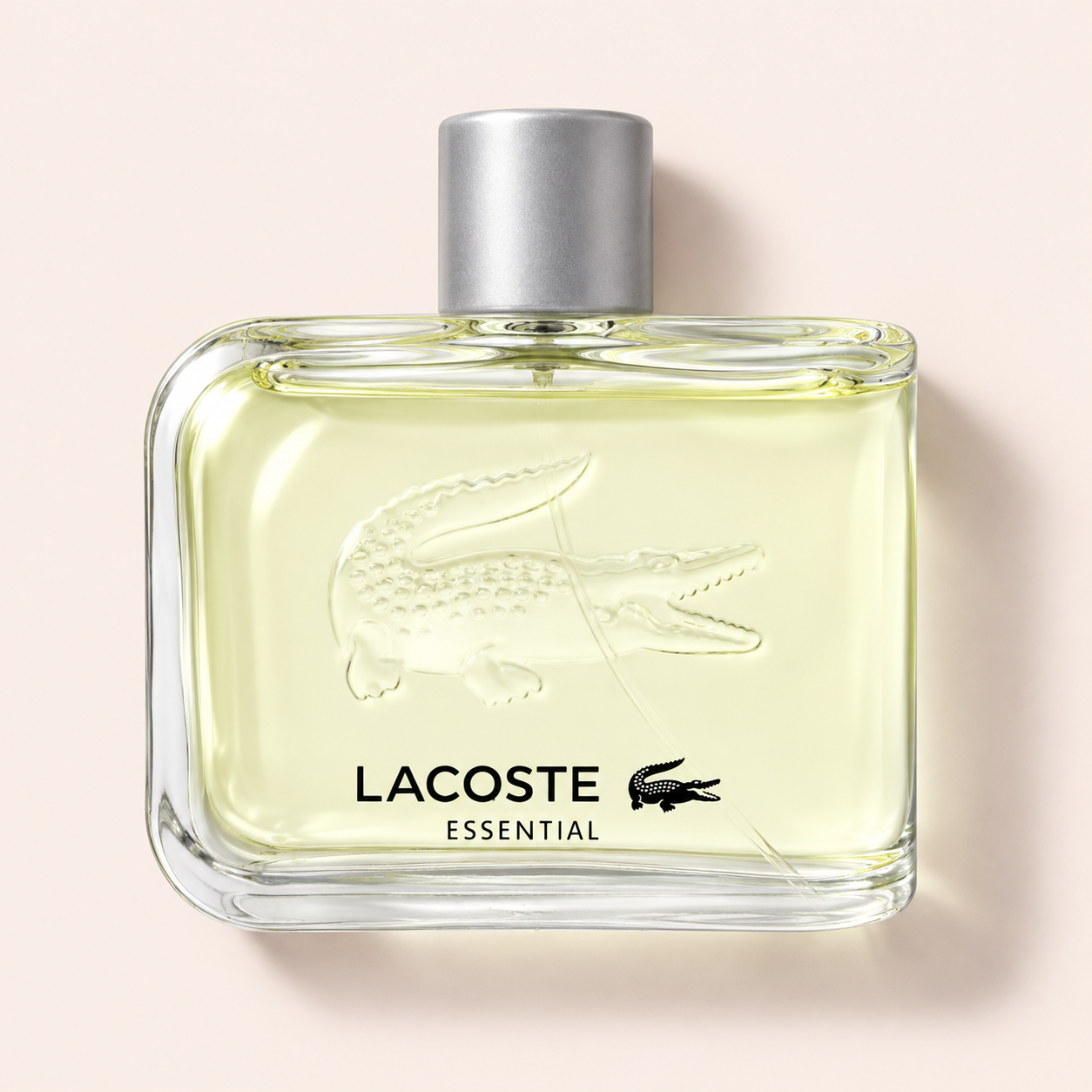Lacoste Essential EDT 125 ml – parfém na světle růžovém pozadí – MrRizz