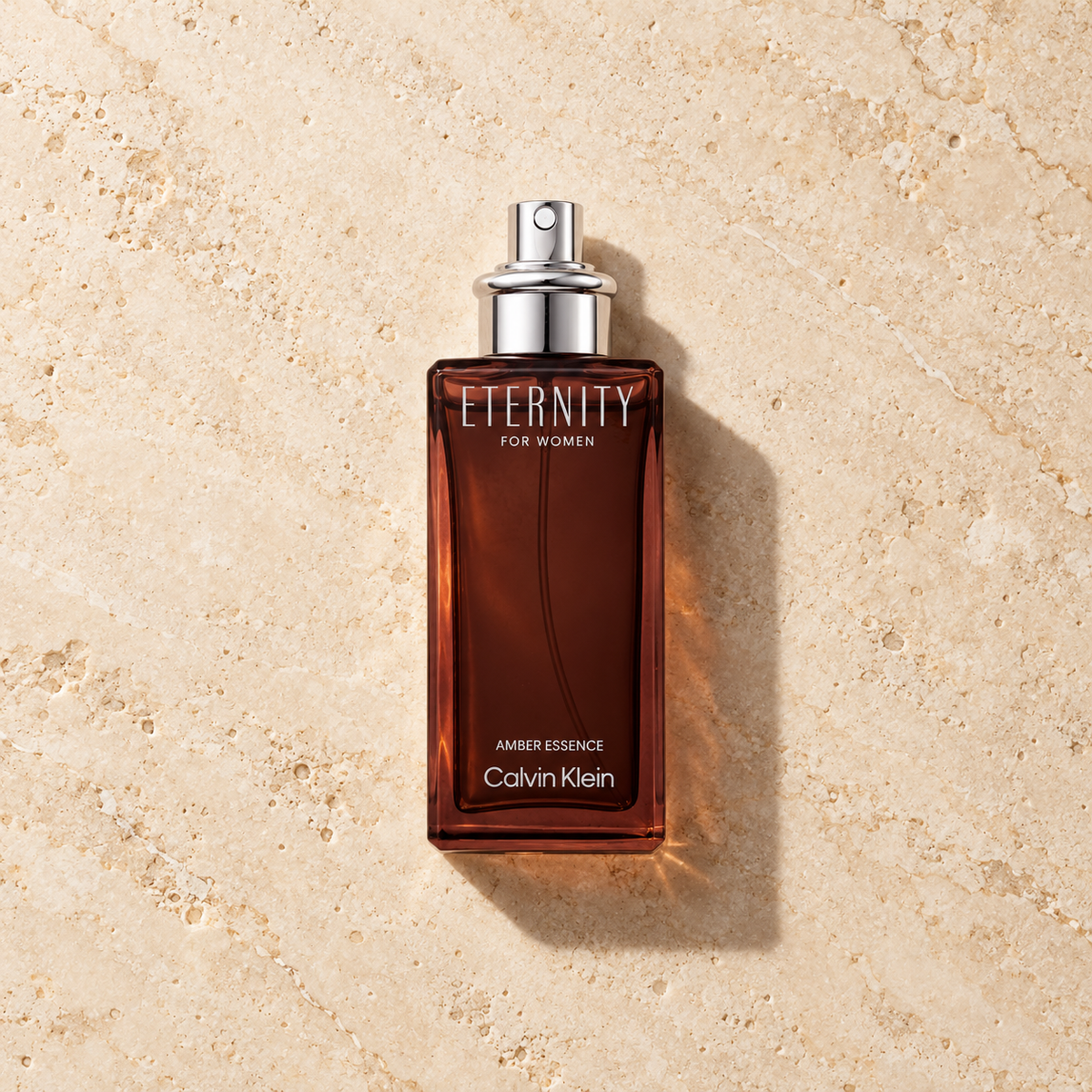 Calvin Klein Eternity Amber Essence 50 ml – parfém v prostředí, pohled shora s bočním stínem