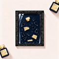 Parfemovy obraz Maison Francis Kurkdjian Oud Silk Mood Extrait v cernem ramu - ilustracni fotografie